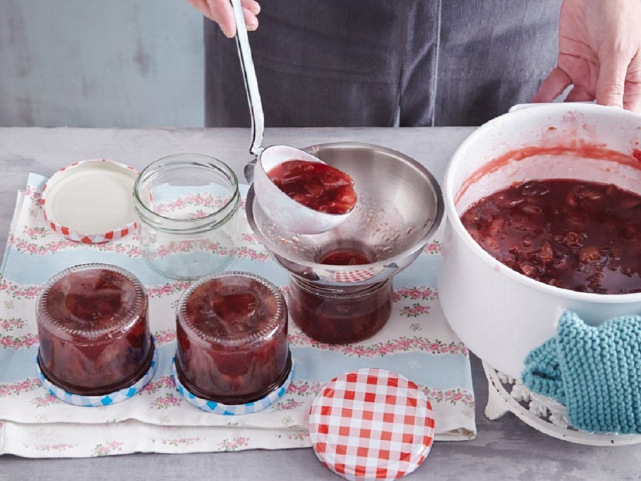 StockFood_12324218_Layout_Homemade_plum_jam_being_filled_into_jars_with_a_funnel